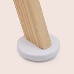 Stable wooden activity gym base with rounded foot design for baby safety