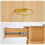 Gold-tone handle and smooth drawer slide details on fluted oak vanity desk