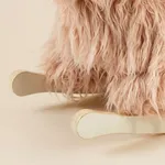 Close-up of labebe wooden rocker base and soft plush yak fur