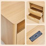 Fluted oak nightstand detail showing wood grain, drawers and charging outlets