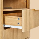 Fluted drawer construction detail on oak bedside table with storage