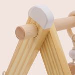 Close-up of smooth wooden play gym frame connection