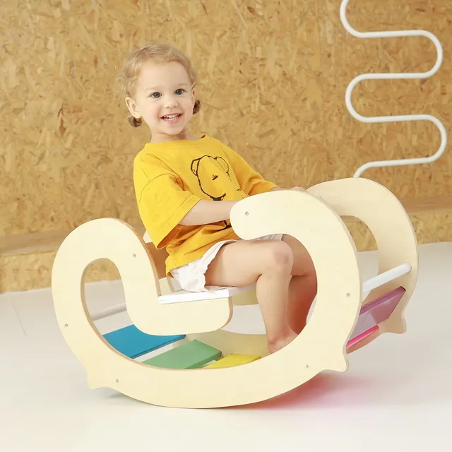 Fauteuil à bascule arc-en-ciel en bois