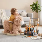Toddler playing with Yak plush rocker and wooden tool bench walker
