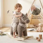 Toddler enjoying a brown plush pony rocker with realistic sound