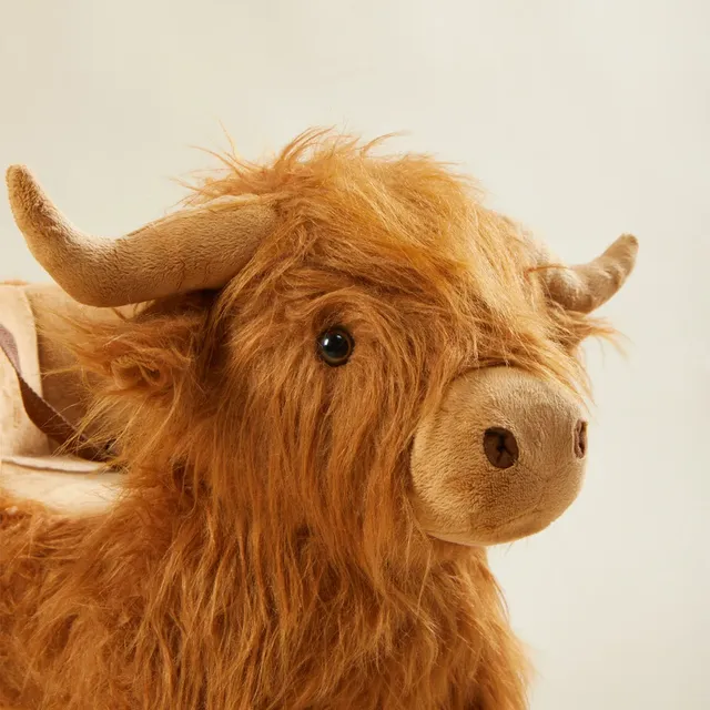 Berceau en peluche en forme de vache des Highlands