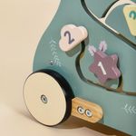 Wooden activity walker with number blocks and adjustable wheel speed