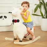 Toddler riding llama plush rocker indoors with wooden rocking base