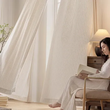 The Waverly textured linen curtain features subtle vertical texture with faint light brown stripes that shift gently with light, like wind moving through fields of wheat — soft and quiet