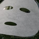 Close-up of Calming Mugwort Mask Sheet material for herbal skincare