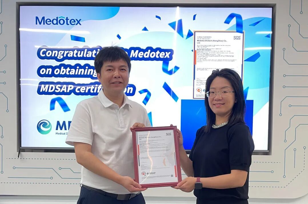 Medotex Biotech team receiving the MDSAP certificate from SGS, celebrating compliance with global medical device quality standards