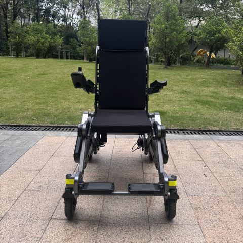 Stand Up, Move Forward: Electric Walking Aid Robot with Powered Lifting & Gait Training Support