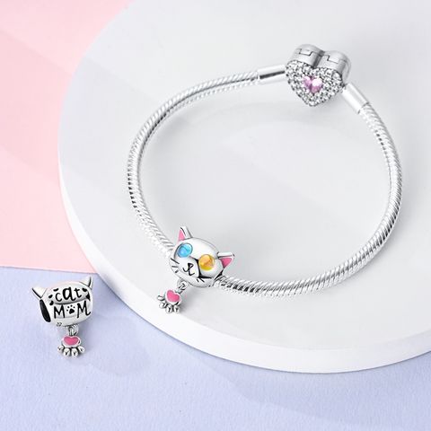 Perles tête de chat élève hétérochromatique