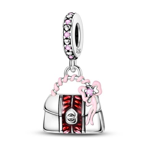 Charm para bolso con lazo rosa