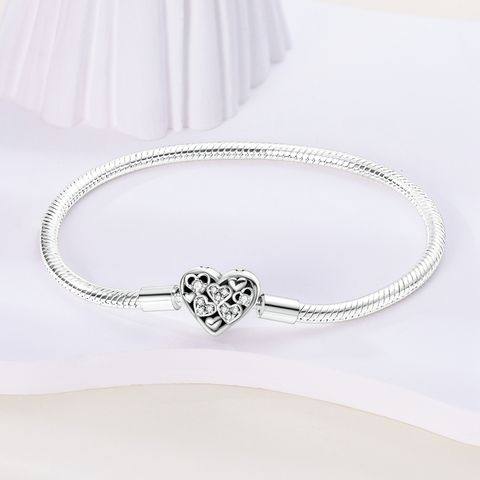 Schlangenarmband aus Herz und Stein