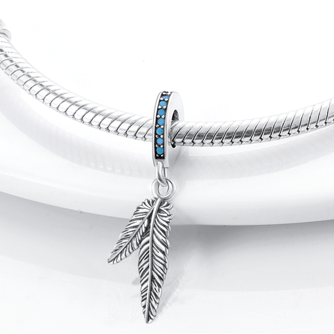 Pendentifs plumes en argent