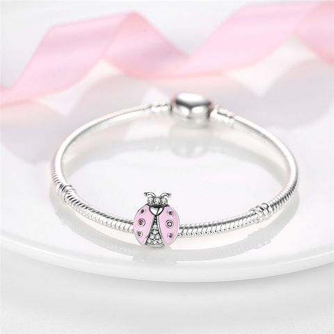 Perles Charmes Coccinelle Rose