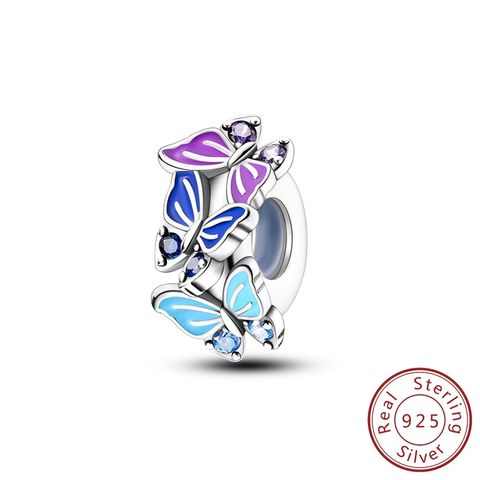Clip de fixation papillon bleu glacier et violet