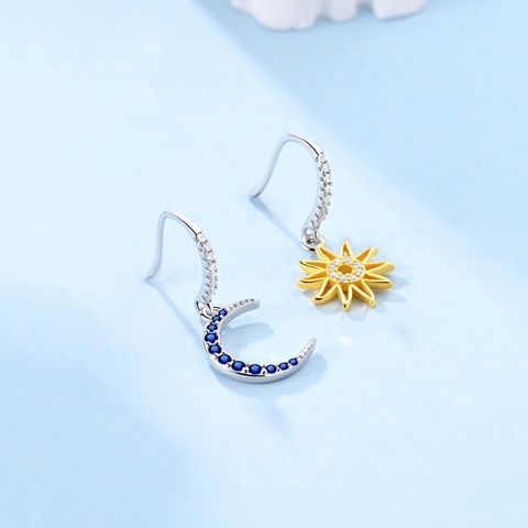 輝く太陽と月のイヤリング