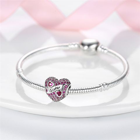Perles en forme de coeur de soeur violet clair