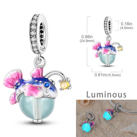 Luminous Fish Charm
