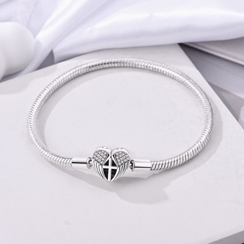 Kreuz Schlangenknochen Armband