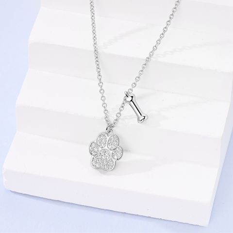 Collier d’os à empreinte de patte