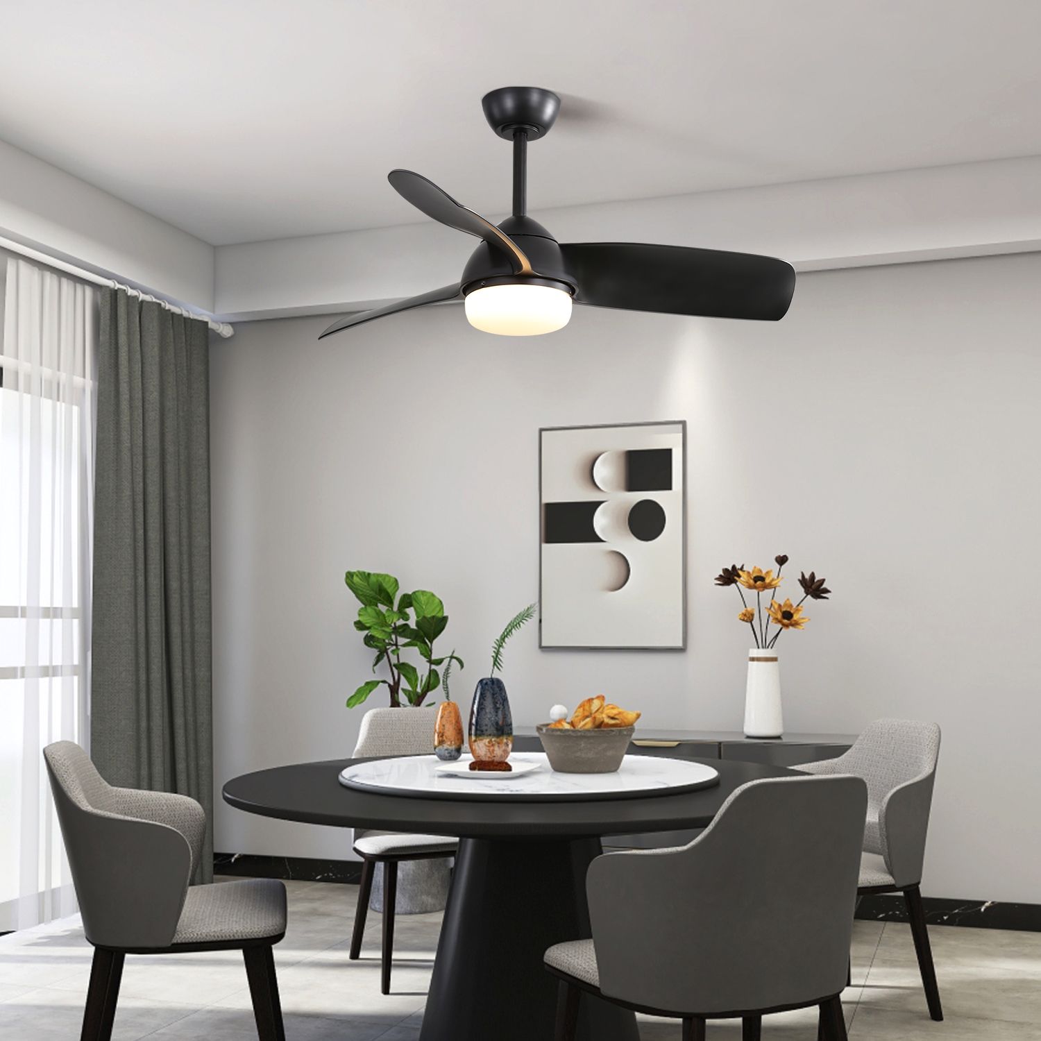black modern fan with light in a room