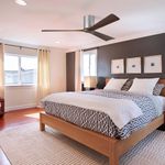 KBS Rustic Wood Flush Mount Ceiling Fan Without Light in a bedroom