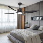 KBS black four blade ceiling fan with light in a bedroom