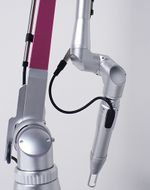 Detailed view of Jontelaser Q-Switch ND Yag Laser's handpiece and articulated arm for targeted laser delivery