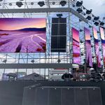 An outdoor event stage featuring a stunning portable LED display screen
