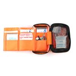 inner display of orange first aid kit with contents