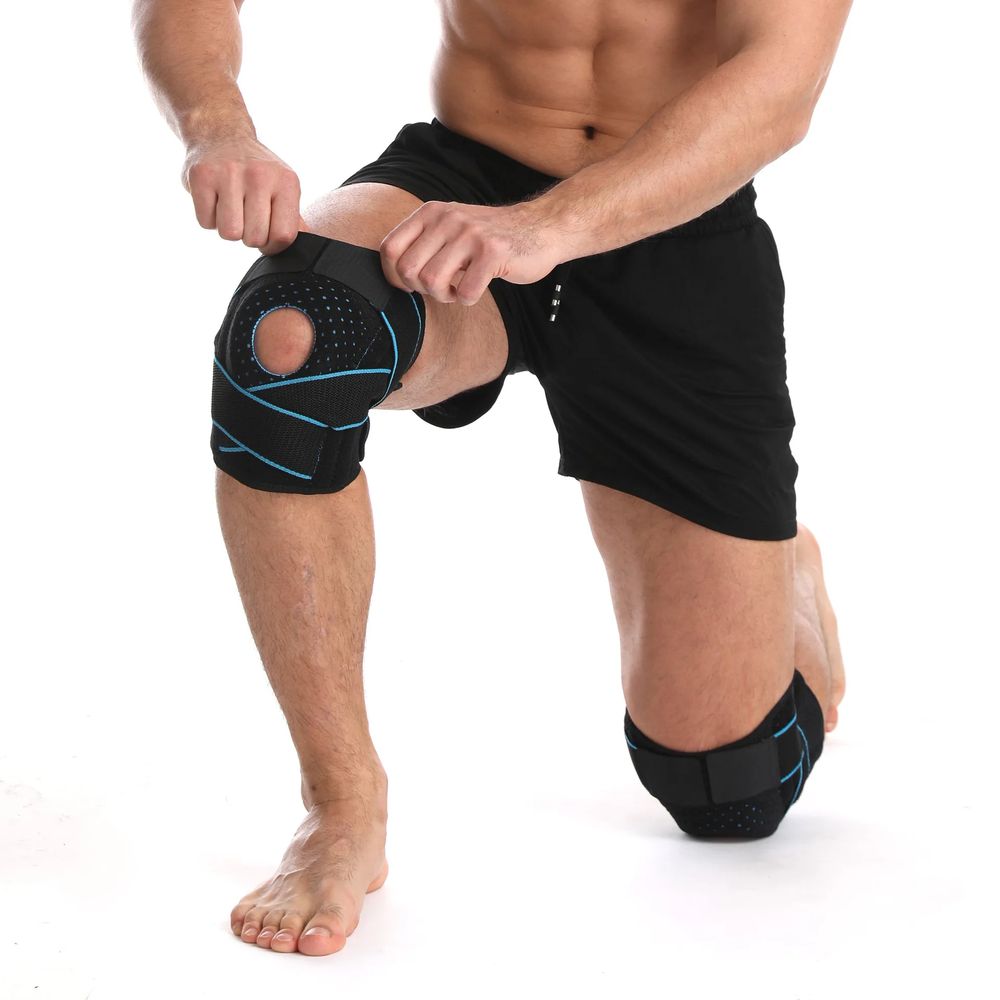 دعامة الركبة الرياضية لحماية الركبة من ضغط الأنسجة الرخوة ملفوفة حول دعامة زنبركية من السيليكون المضغوط