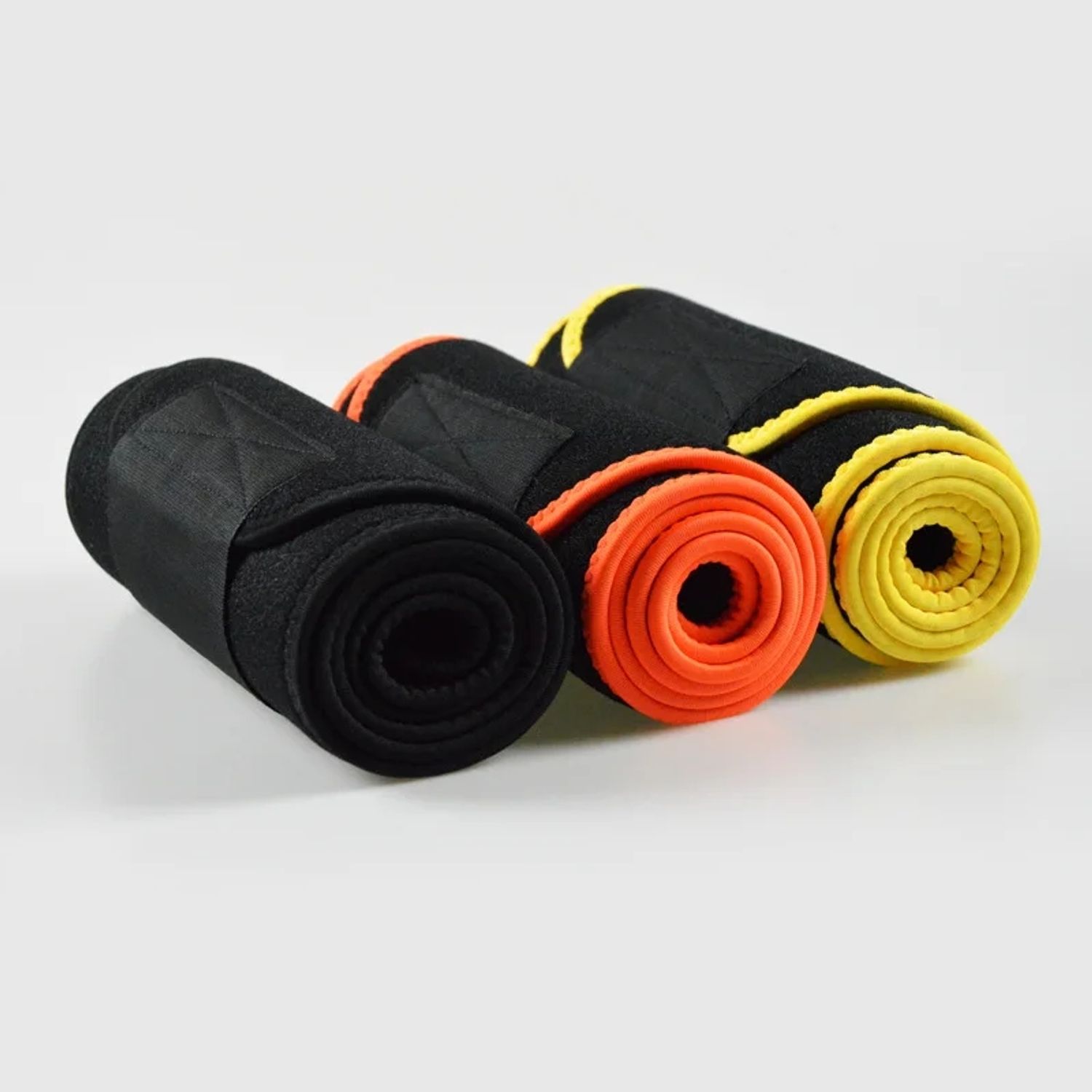 Lee-Mat Sweat Belly Band Roll with different colors: black, orange and yellow