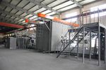 Rotomolding machine featuring shuttle technology for improved production efficiency