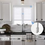 Persilux Motorized light filtering roller shades in kitchen providing privacy while allowing daylight, powered by Eve Motionblinds with Matter over Thread