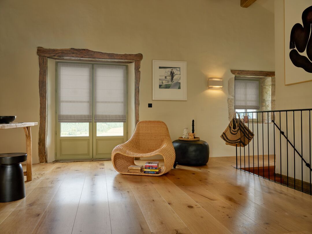A bright, cool white shade may look noticeably different from the warmer wall color